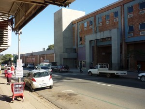 Across the street from the above shops and in what was an open city block used for South African Railways shipments into Swaziland, now stands the first mall in Manzini.  It has two levels of modern stores like many in the U.S.