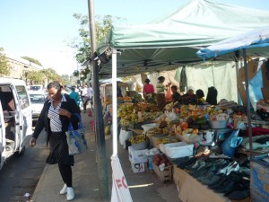 Open markets on the sidewalk across the street from the first mall.